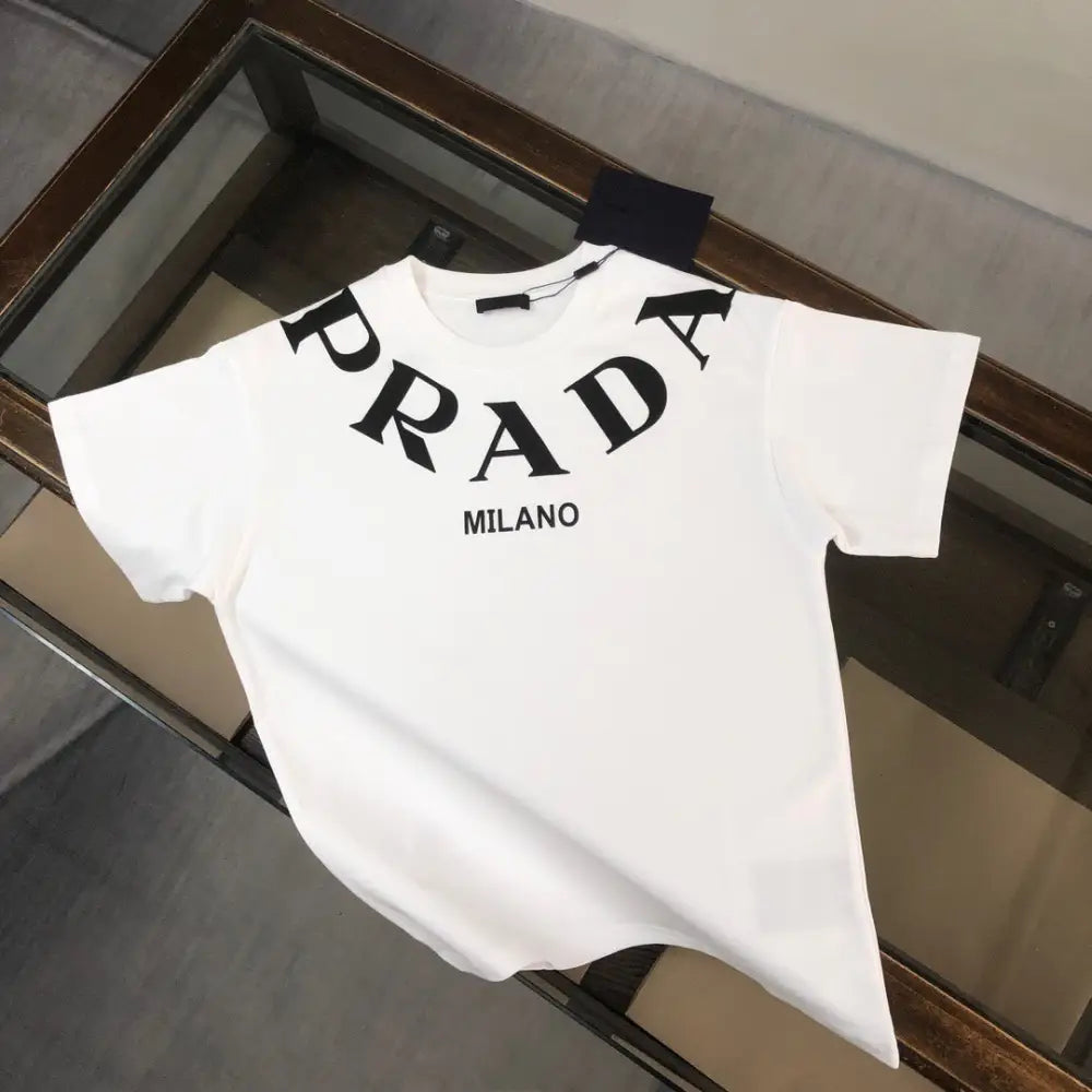 White Prada printed short-sleeved t-shirt with bold black Milano lettering