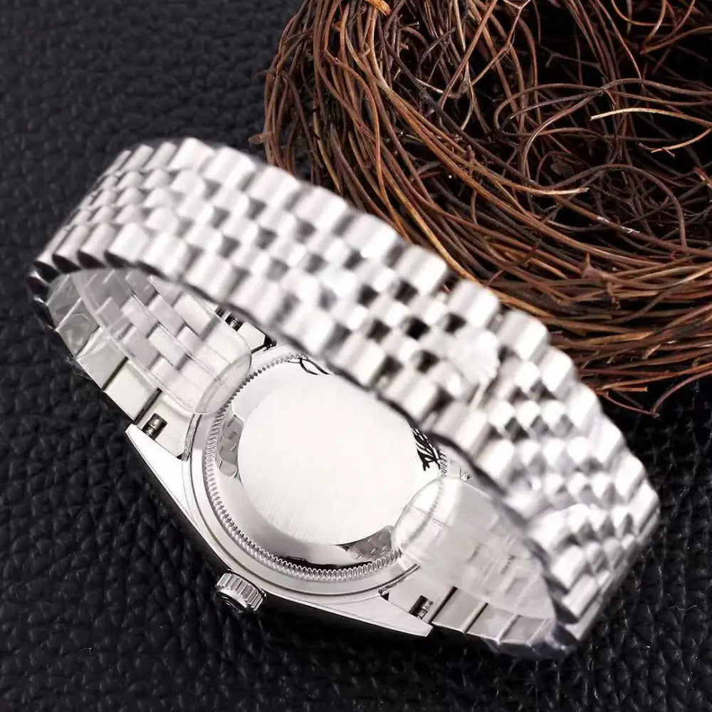 Elegant Rolex Datejust man with silver stainless steel Oyster Perpetual mesh bracelet
